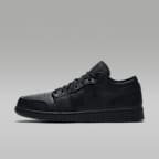 Black low cut jordans best sale